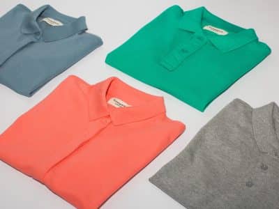 green crew neck shirt and gray crew neck shirt